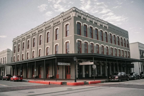 A classic historical building facade in Downtown Galveston, Texas on a cloudy day. in Galveston Scavenger Hunt, TX