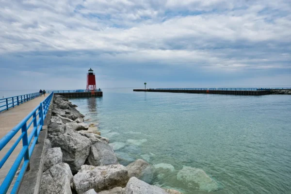 Beautiful view of Charlevoix South Pier Lighthouse with tranquil Lake Michigan waters. in Charlevoix Scavenger Hunt, MI