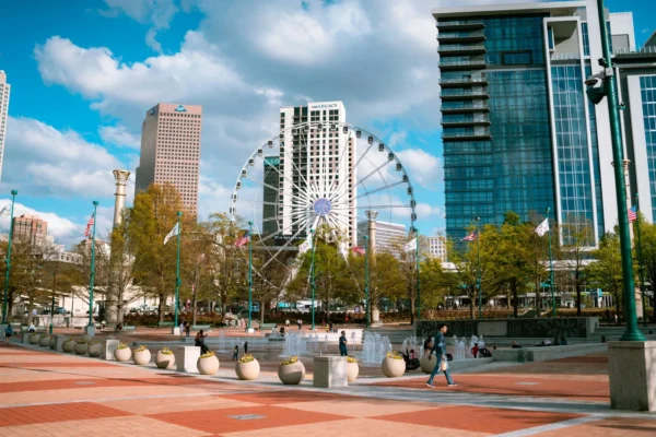 Day view of Centennial Olympic Park with skyscrapers and Ferris wheel in Atlanta, Georgia. in Atlanta Scavenger Hunt, GA