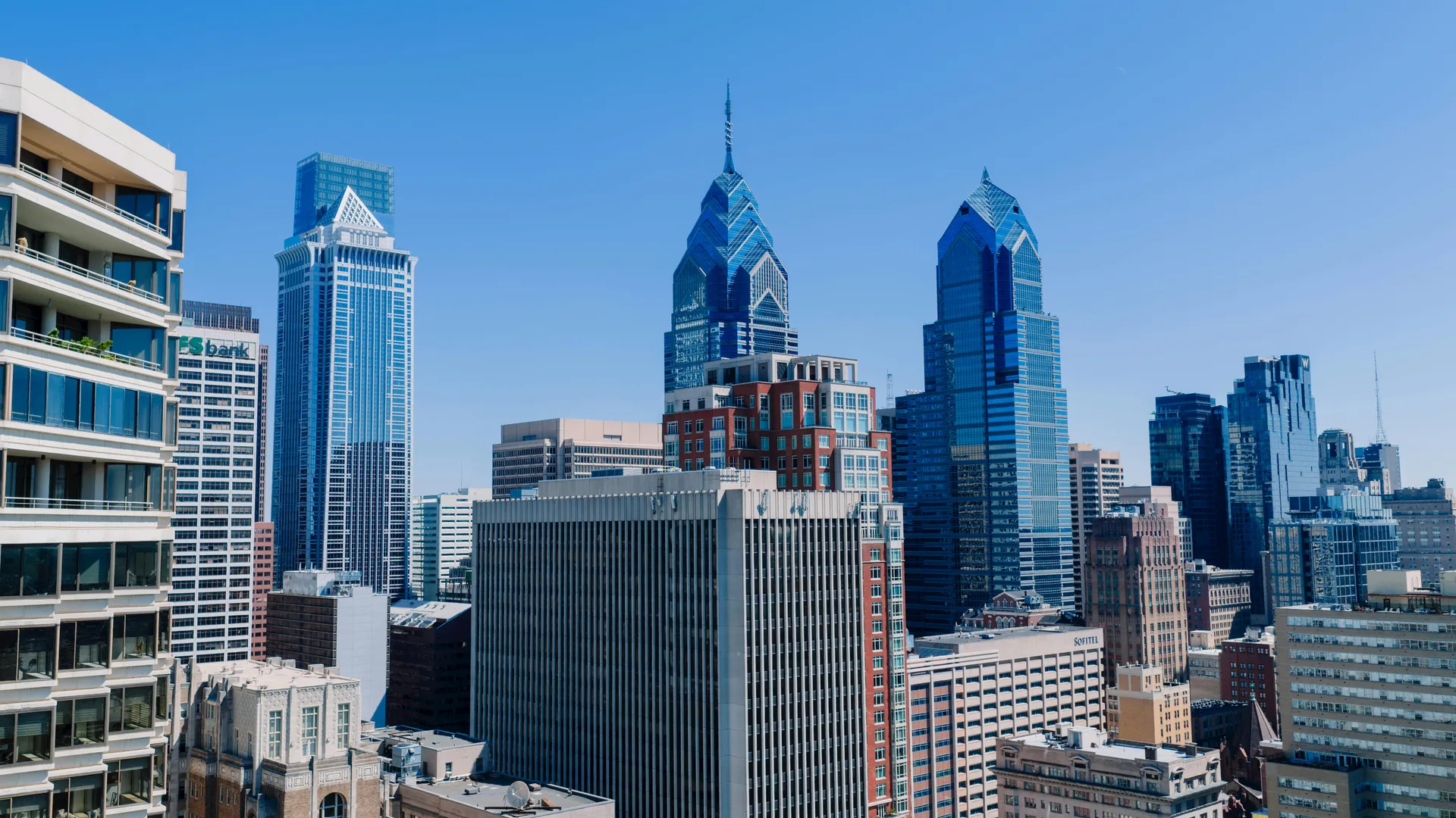 Aerial view of Philadelphia's cityscape showcasing the skyline's iconic skyscrapers on a clear day. in Philadelphia Scavenger Hunt