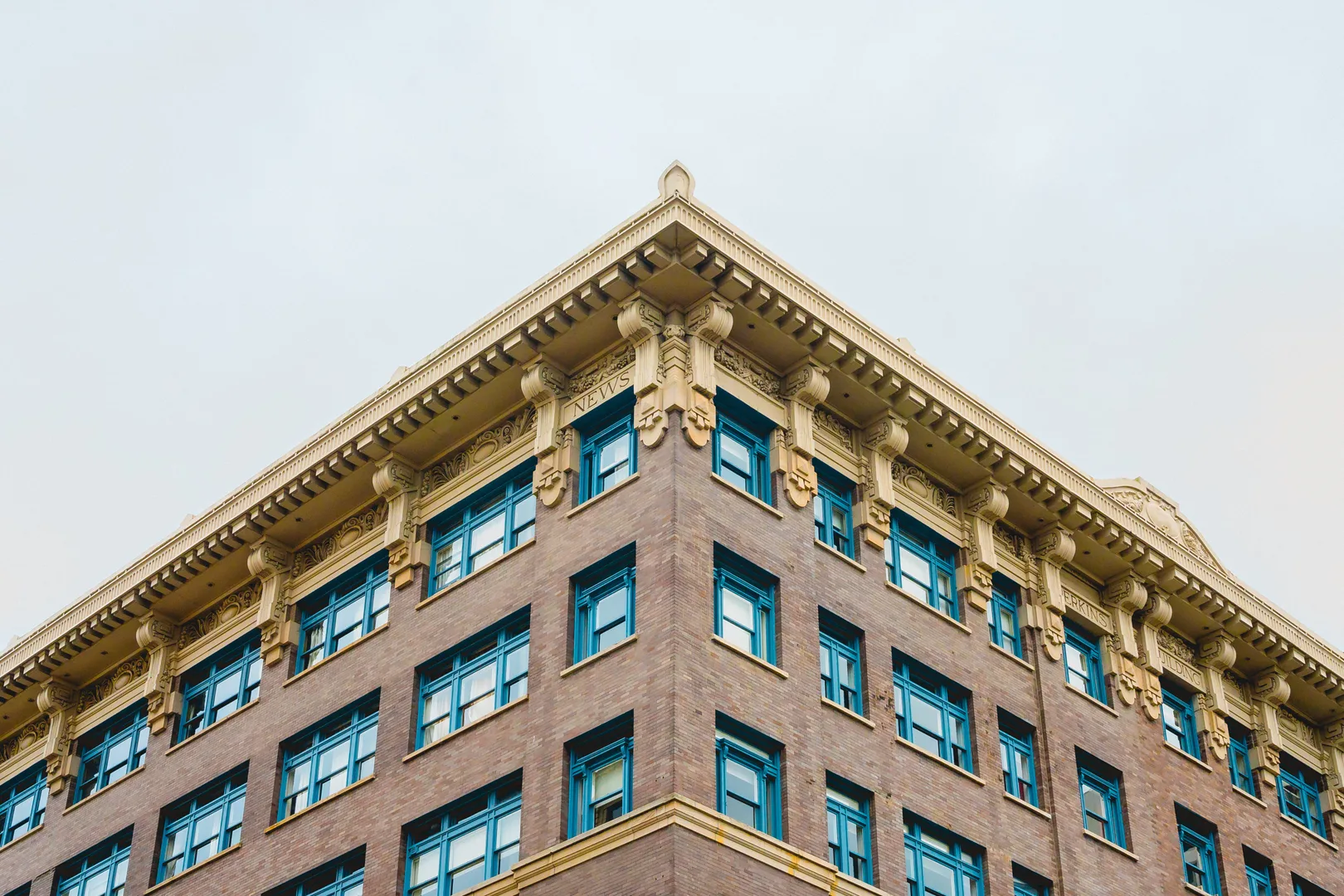 Low angle view of a classic multi-storey building showcasing vintage architecture in Tacoma, WA. in Tacoma Scavenger Hunt