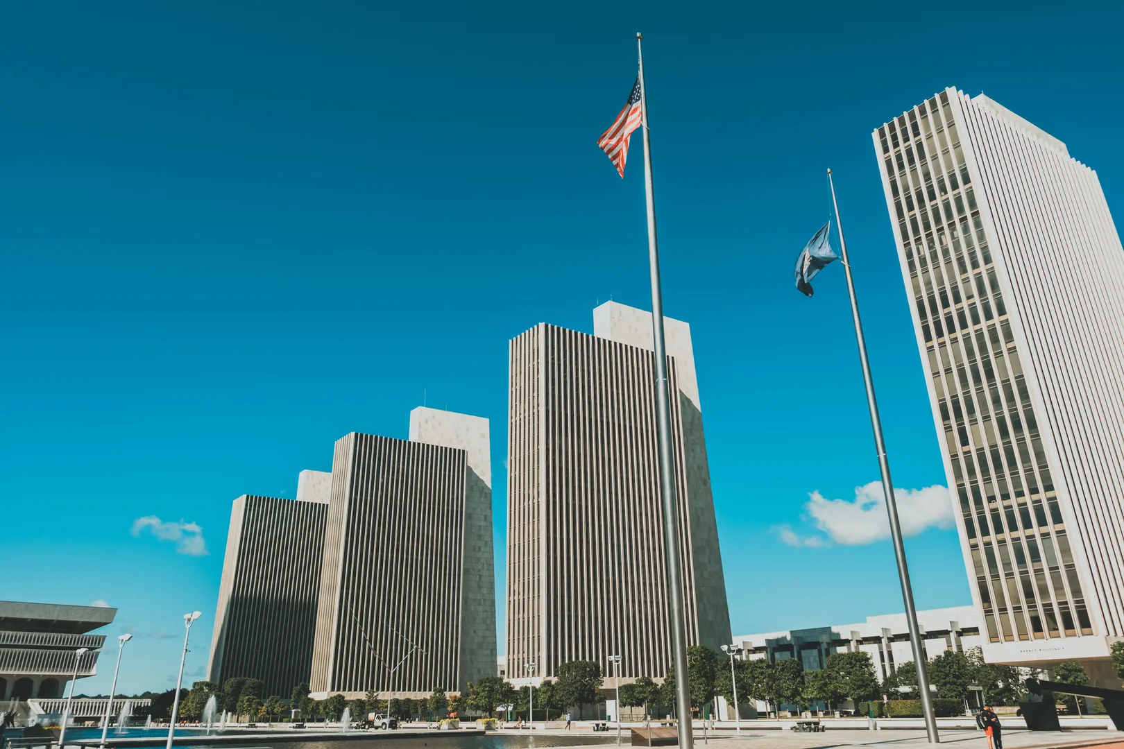 Modern skyscrapers towering at Empire State Plaza in Albany, New York under a clear blue sky. in Albany New York Scavenger Hunt